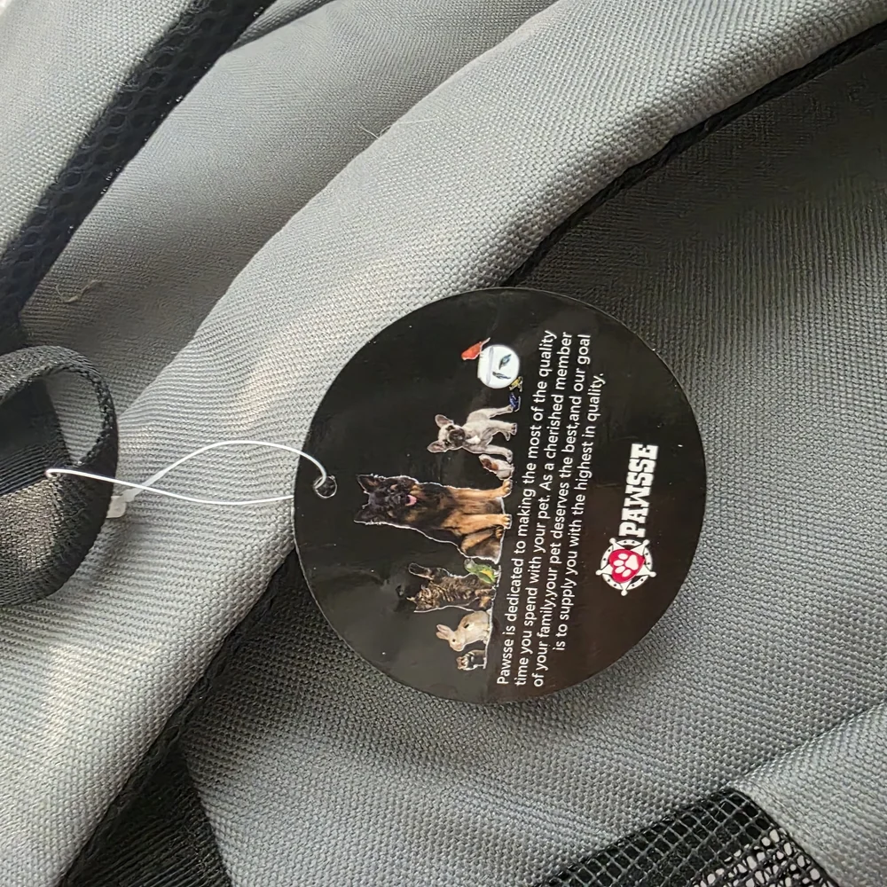 Gray Pet Carrier Backpack With Water Bowl by Pawsse